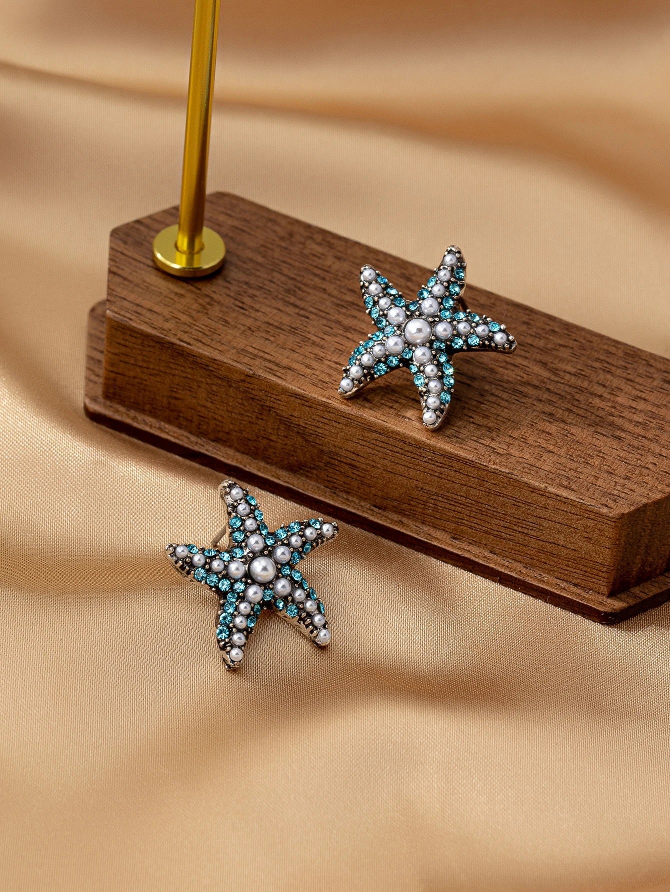 עגילים דגם ים