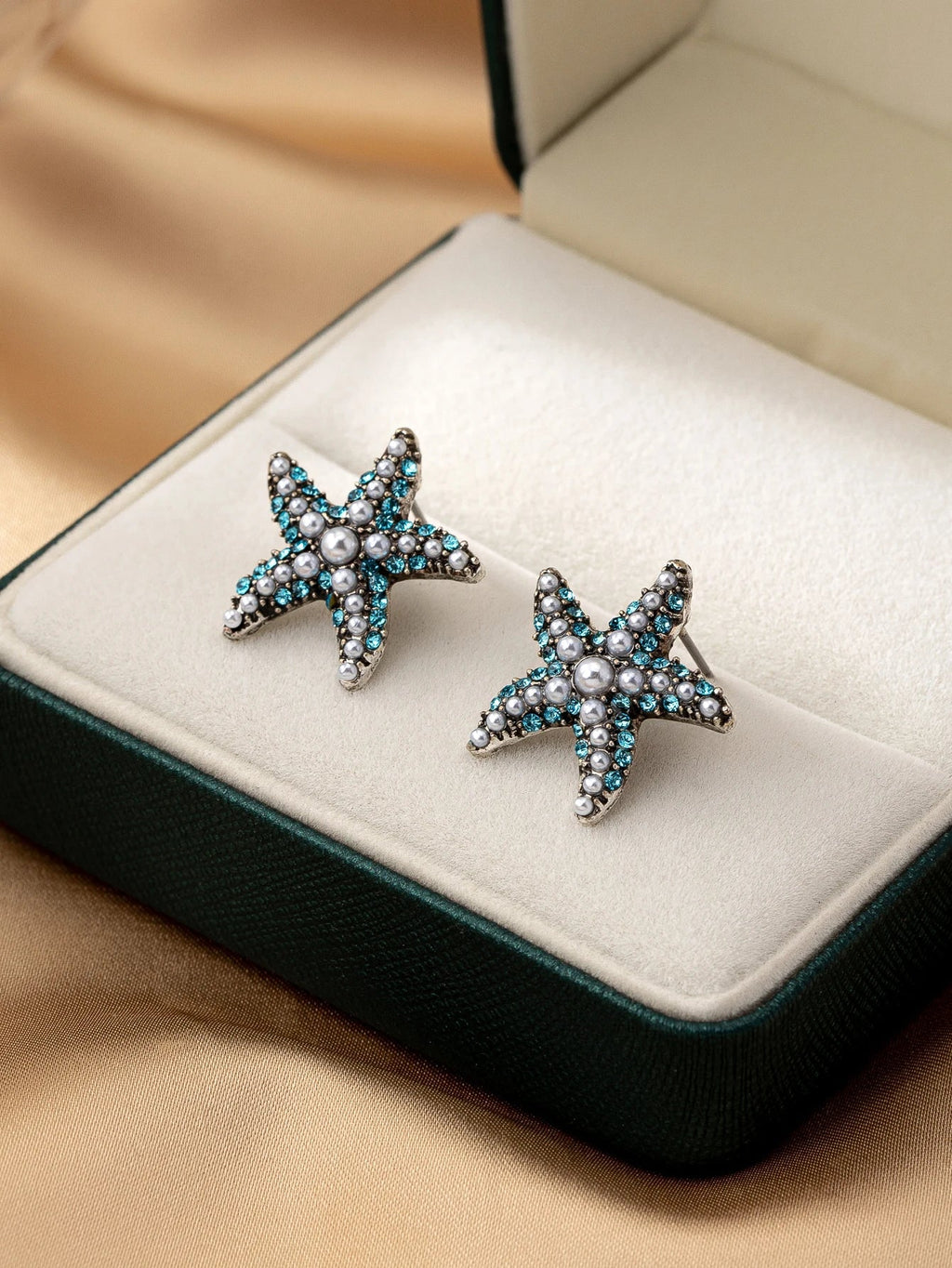 עגילים דגם ים